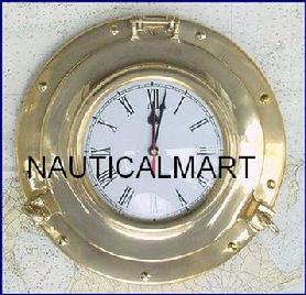 http://nauticalmart.net/images/278_SH48610_Brass_Porthole_Clock.jpg